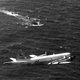 A US Navy P-3 flies over a Victor II-class submarine in the Atlantic. US Navy photo